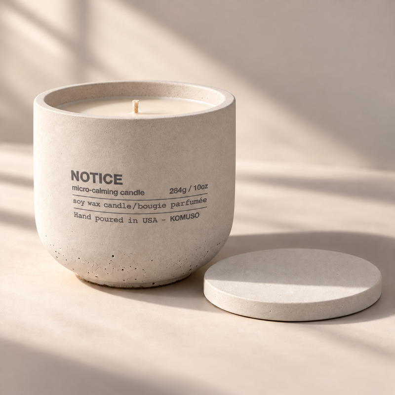 NOTICE handcrafted ivory candle with soft gray stamp
